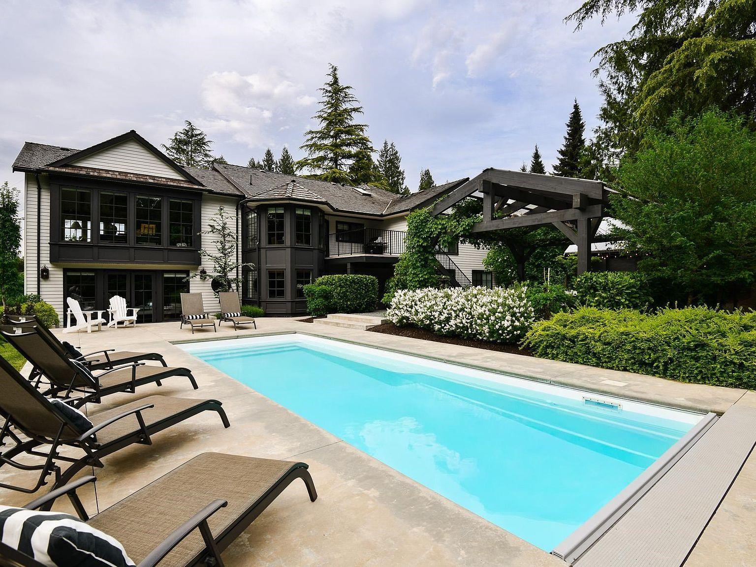 Fibreglass backyard swimming pool at a residential property in Abbotsford BC